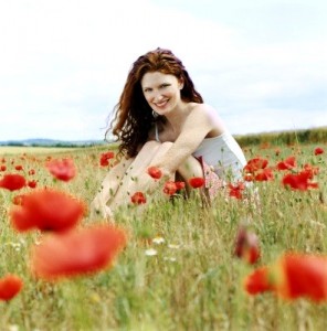 red head in flowers